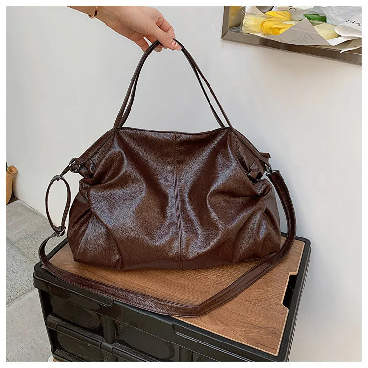 L'indispensable Sac Polyvalent - Adaptez Votre Style en Couleur