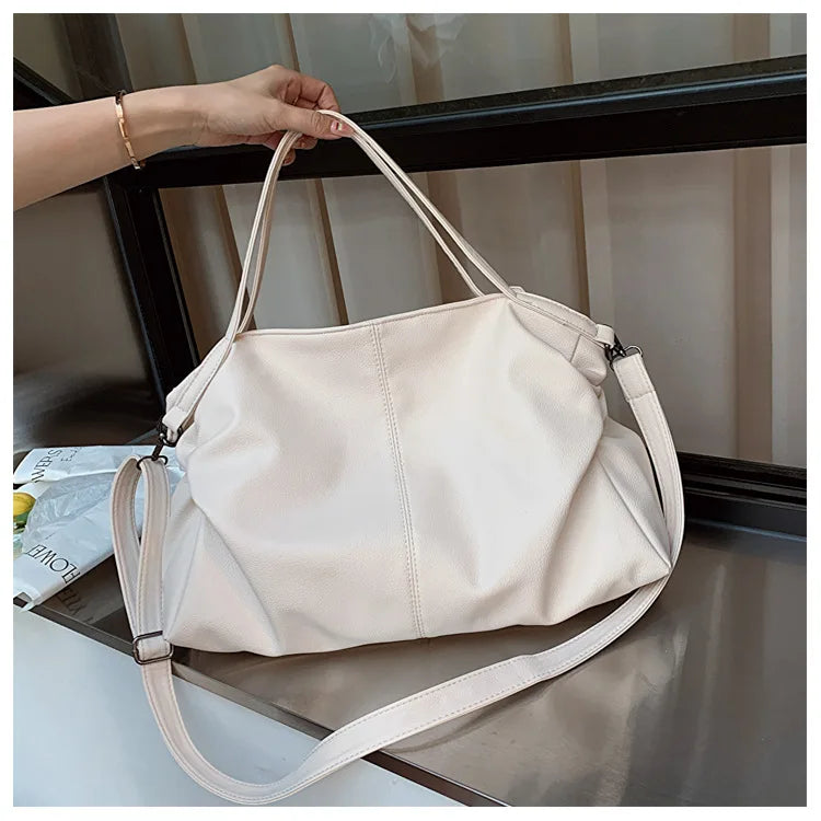 L'indispensable Sac Polyvalent - Adaptez Votre Style en Couleur