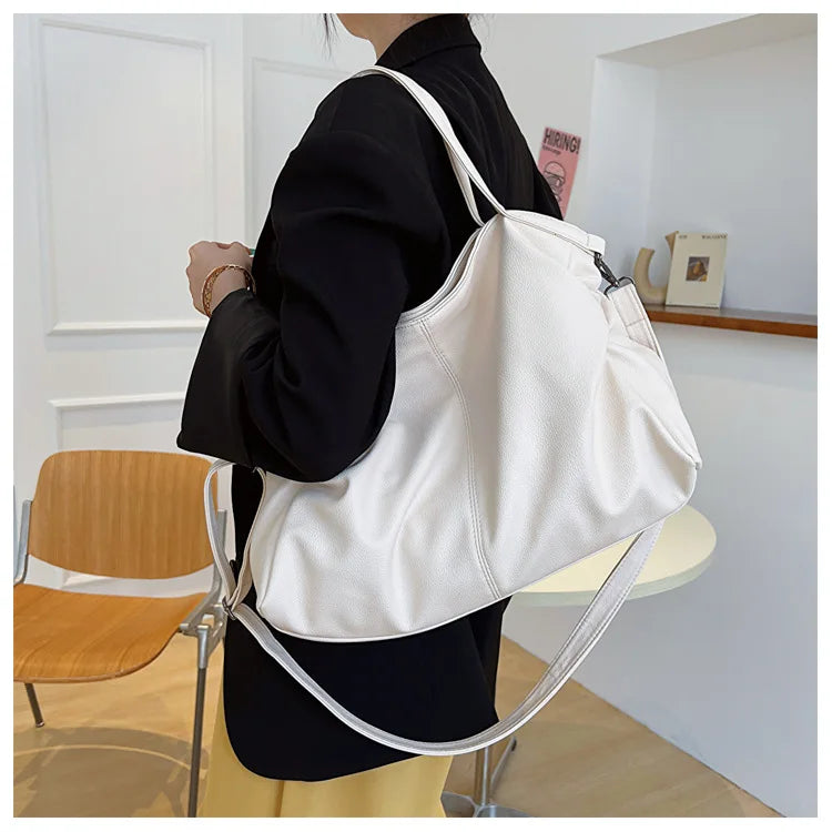 L'indispensable Sac Polyvalent - Adaptez Votre Style en Couleur